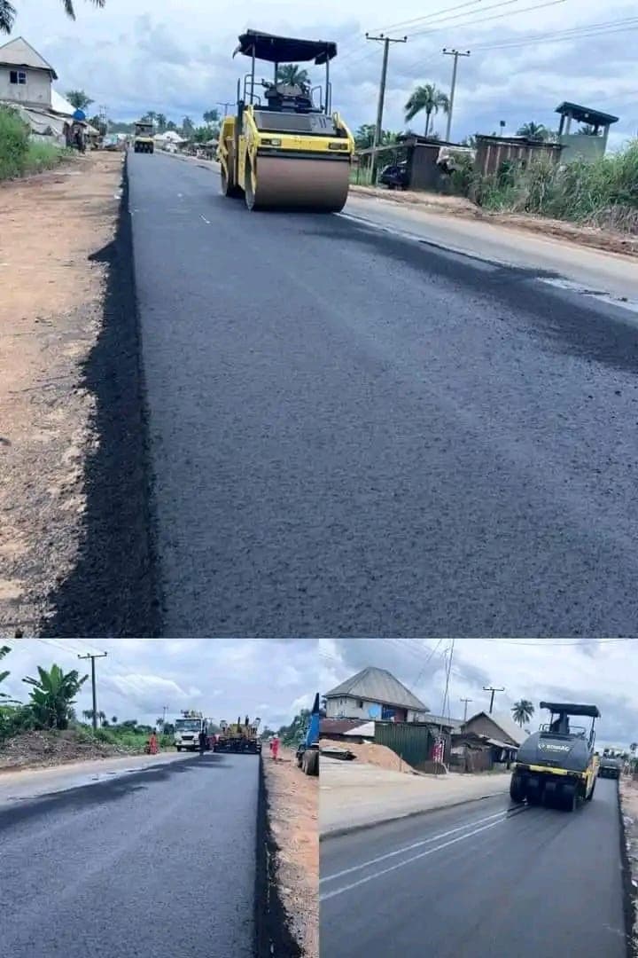 Road rollers compacting freshly laid asphalt