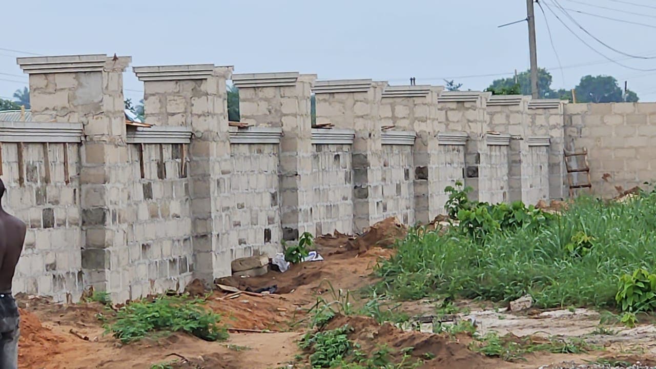 Concrete block perimeter wall under construction